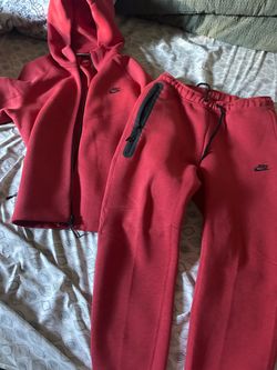 Red Nike tech fleece