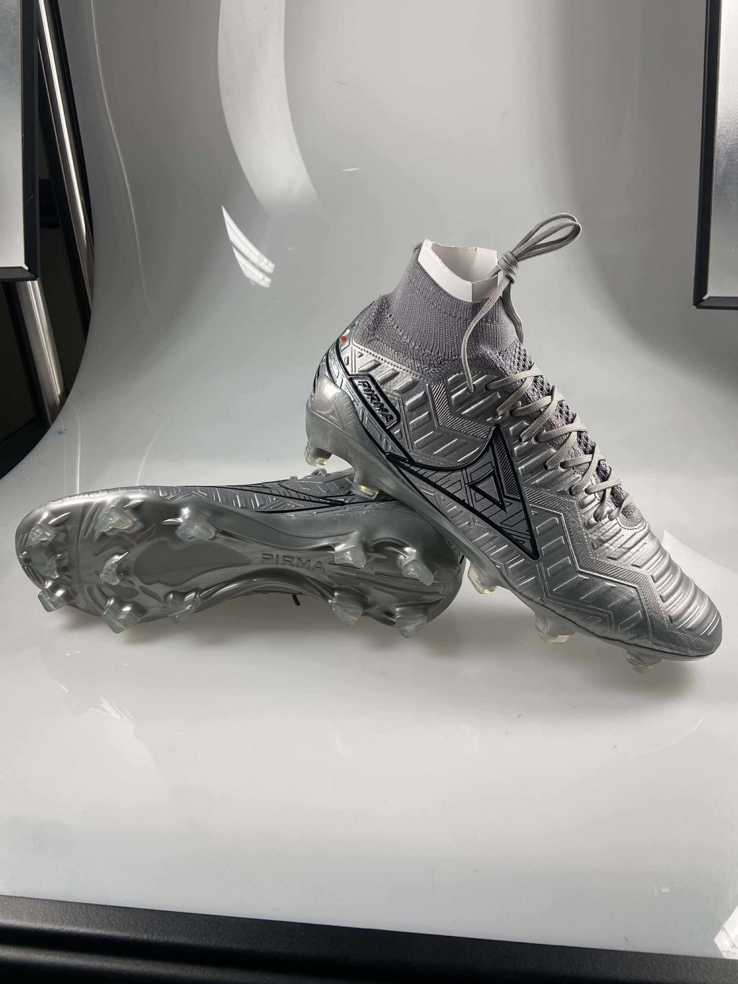 Zapatos pirma de botita color plata