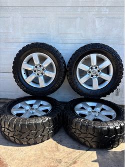 20 inch Nissan Titan and Armada wheels with 98% tires!!