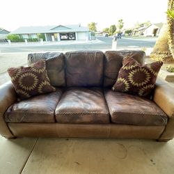 Alexander Sinclair, down-filled high-end leather couch
