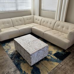 Cream leather sectional from Macy’s
