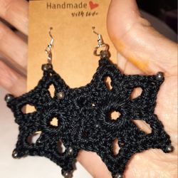Black star shaped earrings 