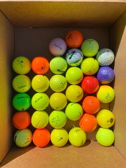 Golf balls colored