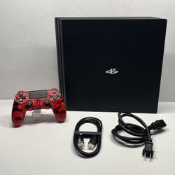 Ps4 pro 1Tb with red cami controller.