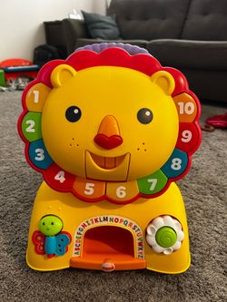 Fisher Price 3-in-1 Sit, Stride, and Ride on Lion