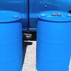 1 blue plastic 55 gallon barrels / rain barrels