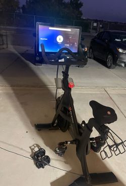 Peloton Bike with shoes and pedal attachment