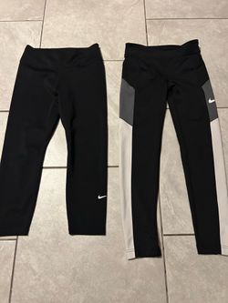 2 Nike sport leggings medium for youth $15 both firm