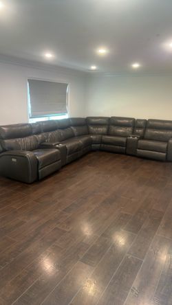 Large leather reclining sectional couch