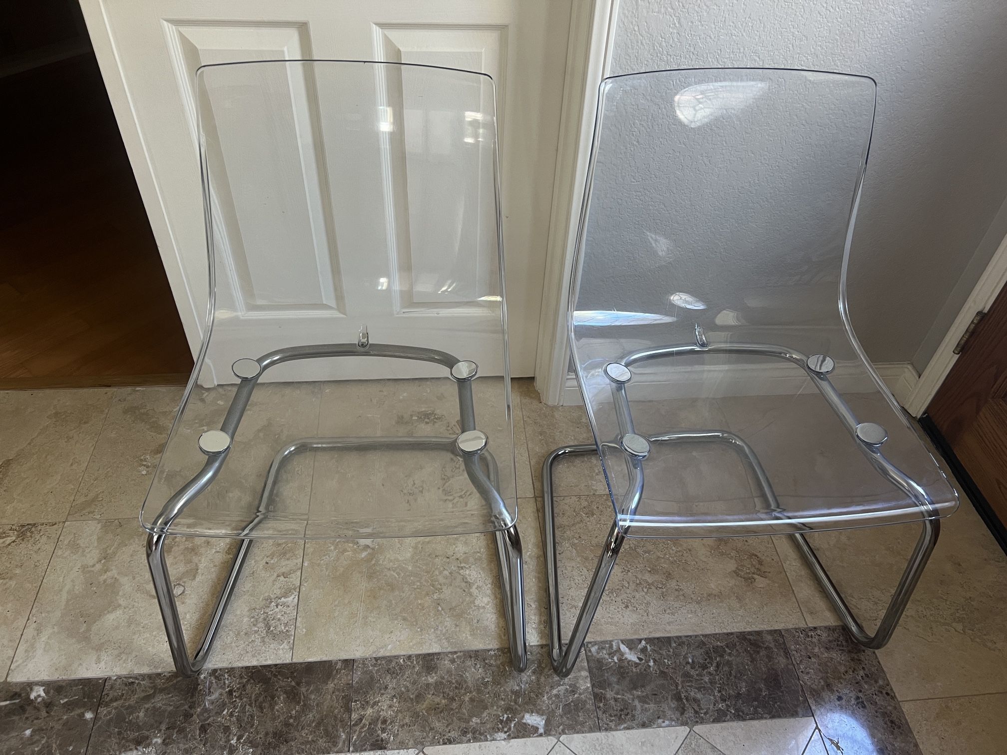 2 IKEA Clear Chairs 