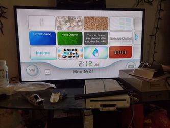 Nintendo Wii bundle deal 4  games $100 for everything firm