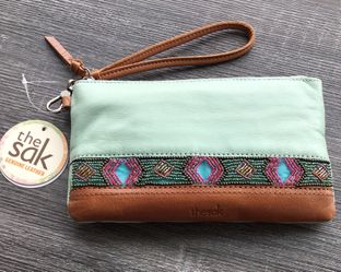 The Sak Sanibel Charging Wristlet w/ built in power bank