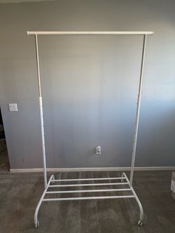 Clothes rolling rack