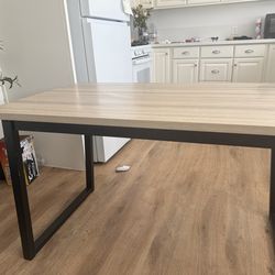 Beautiful natural wood dinner table with matching benches