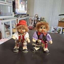 Set Of 2 Vintage Porcelain Clown Figurines Holding Musical Instruments, Bendable & Twistable 8" Tall 