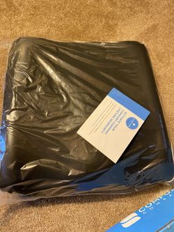 Wheelchair cushion with comfort tek cover
