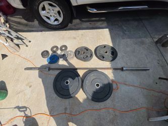 Olympic Barbell and Weights (270 lbs)