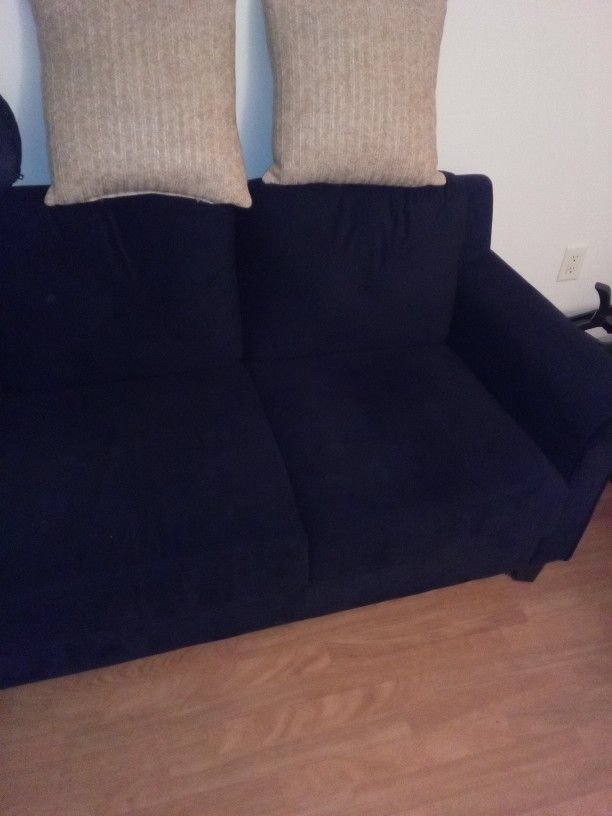 Couch And Kitchen Table.
