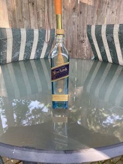 Blue label empty bottle