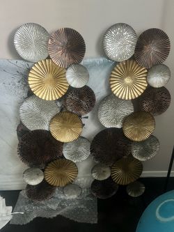2 identical wall hangings. Perfect for either side of TV