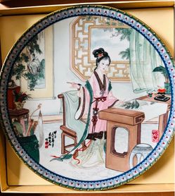 This is a limited-edition porcelain plate titled "Hsi-Chun" (or Xichun) from the "Beauties of the Red Mansion" series