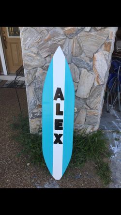 Hand crafted made to order personalized surfboard solid wood