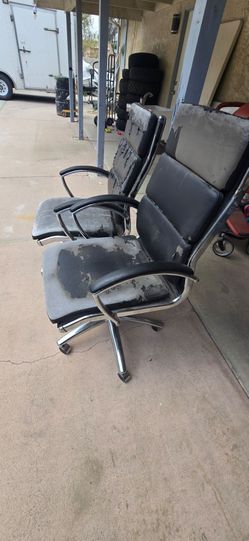 Office chair needs new upholstery.
