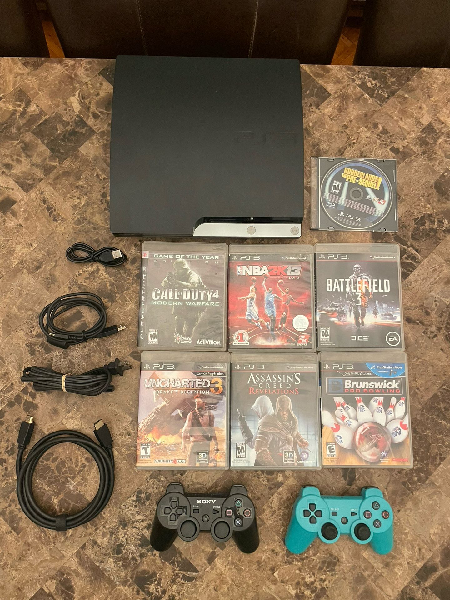 Sony Playstation 3 PS3 Slim 500 GB - Modded - With Over 42 Games pre installed + 7 Physical games