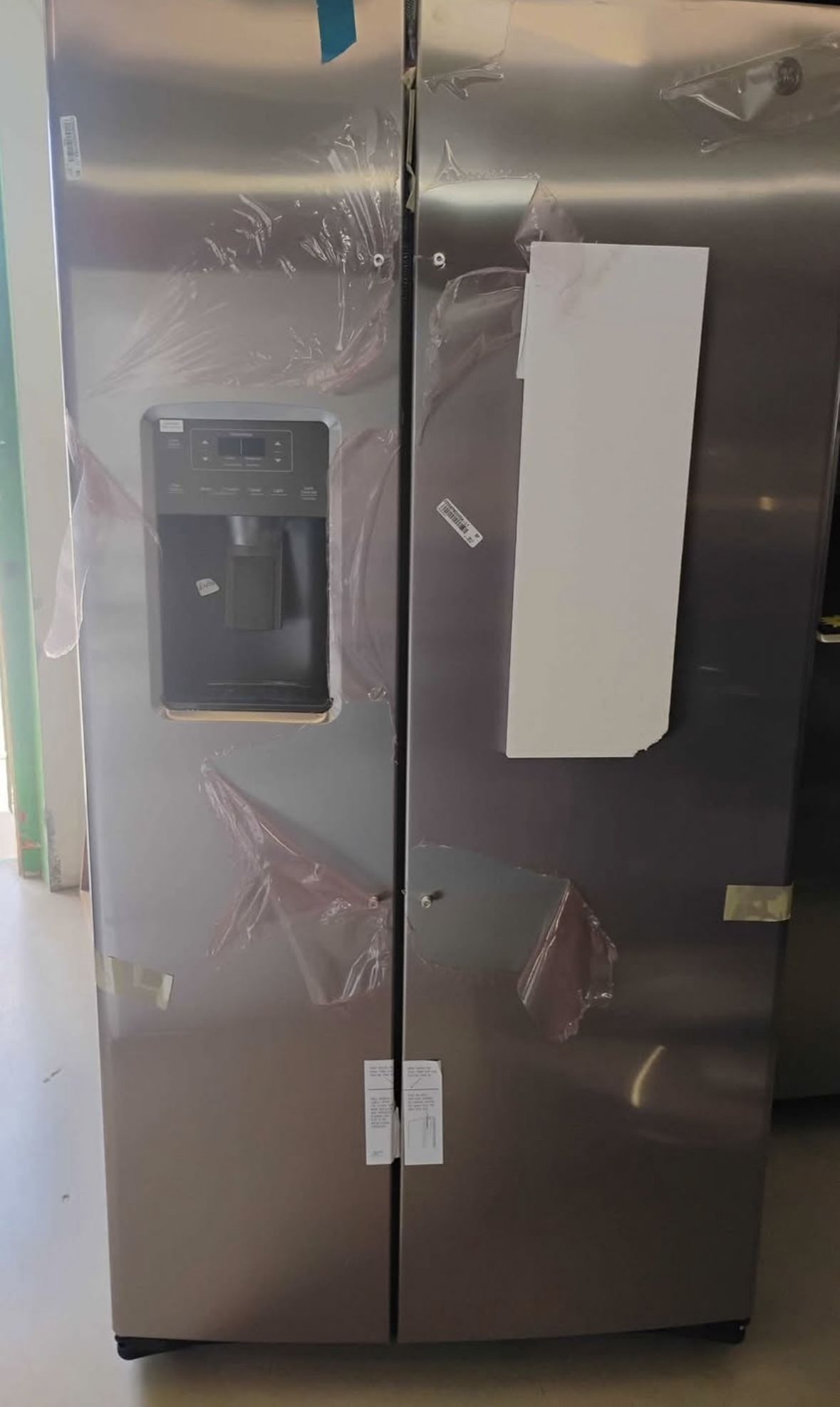 GE Refrigerator Stainless Steel 36”w. 32”d. 70” tall