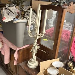 Vintage chalkware cherub lamp with five candle holders.