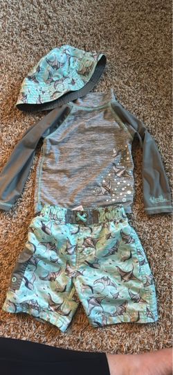 3t swim suit and kid floating