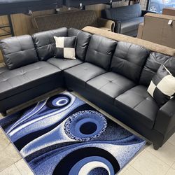 Black Sectional With Ottoman