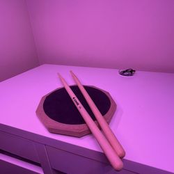 Drum practice pad + brand new drumsticks — $15