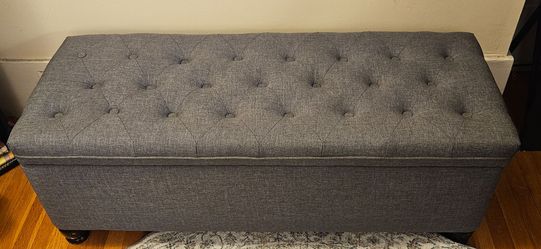 Grey ottoman with storage