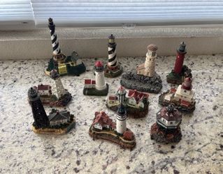 11 Miniature Lighthouse Collectible Collection Set. Average is about 4-5 inches. Excellent quality. Not toys. Most were $15-$20 each but selling all f