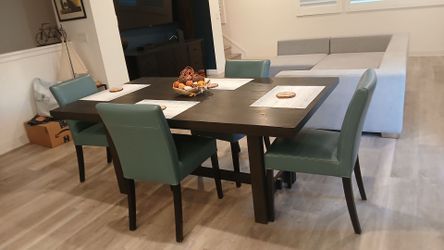 4 teal colored dining chairs