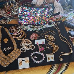 -​✨ The "Gilded Glam" Jewelry Lot – 15+ Pieces + Sequin Pouch for $45!
​Step into the spotlight with this stunning, high-shine collecti