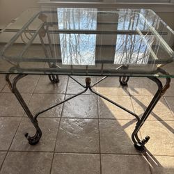 Kitchen table rod iron with glass top four chairs