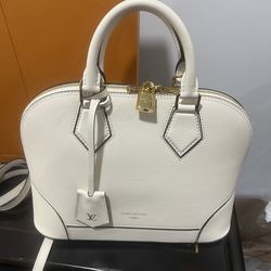 Brand new Louis Vuitton Alma Silhouette PM calfskin w tags