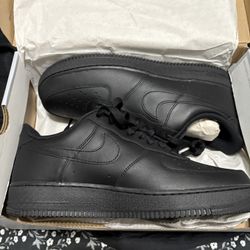 Air Force 1s Size 11.5. 