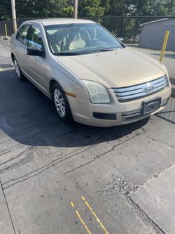 09Ford Fusion (Negotiable)
