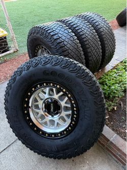 Kmc Chevy silverado wheels and tires 315/70/17