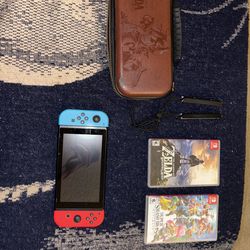Nintendo Switch, Nintendo Pro Controller, 2 Games, and Legends of Zelda BOTW Carrying Case