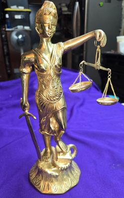 Vintage Heavy Solid  Brass Lady Justice statue.Material and Color: The sculpture is crafted from high-quality brass with a polished gold finish.Symbol