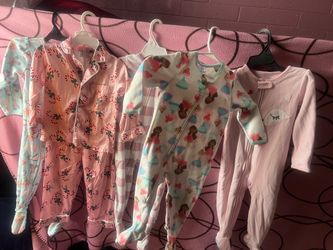 A bag full of baby girl clothes