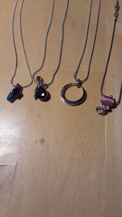 Sterling Silver chains. The pendants are costume and sold separately