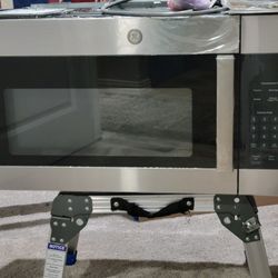 Brand New Microwave  Over Range. 