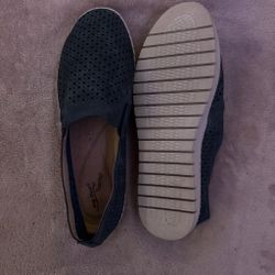 Navy blue sneakers