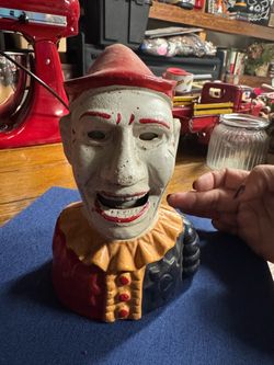 Vintage cast iron Humpty Dumpty / Clown mechanical coin bank.