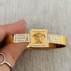 Versace Gold & Crystal Greek Key Design Medusa Head Bangle Bracelet